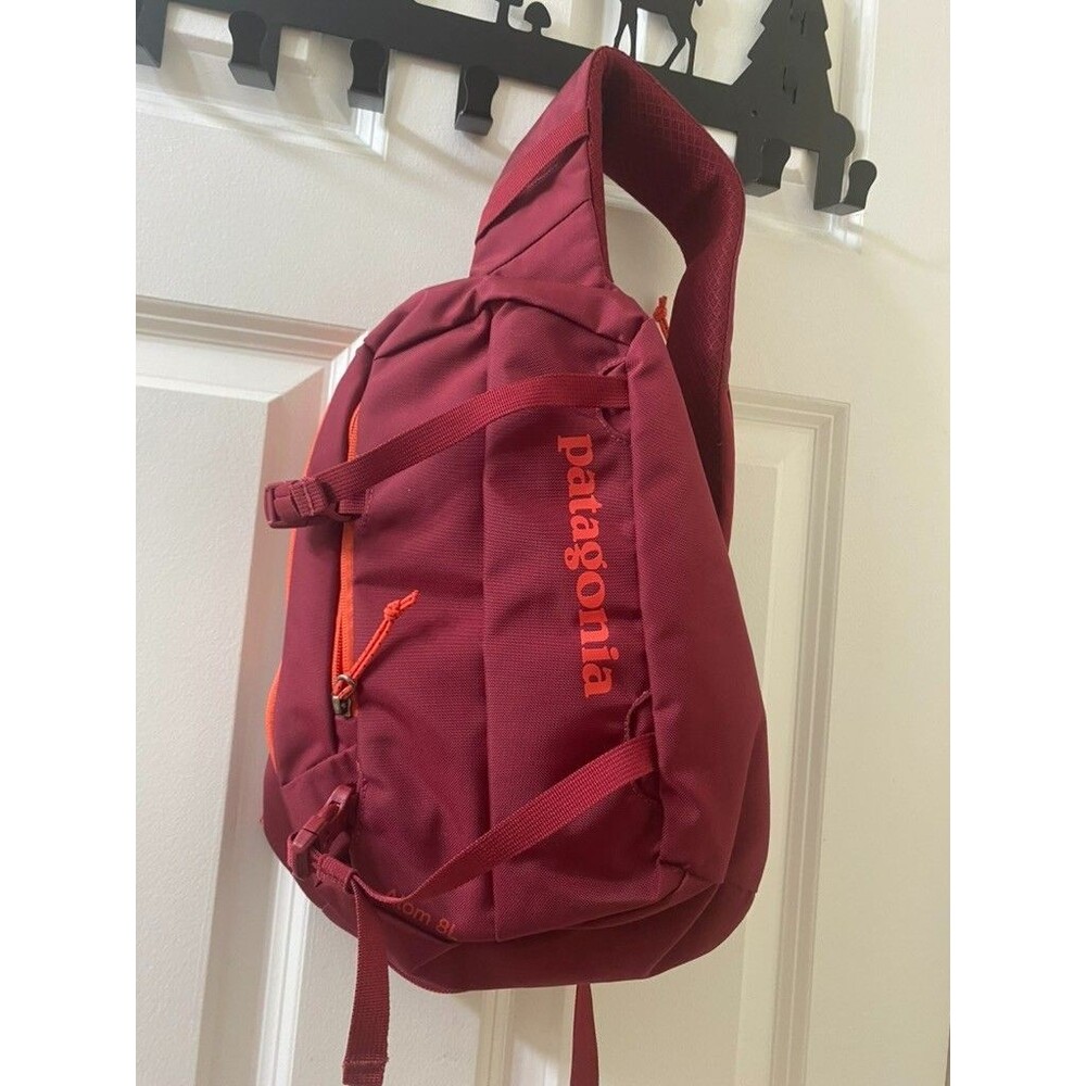 Patagonia Atom 8L Sling Cross Body Bag red and orange